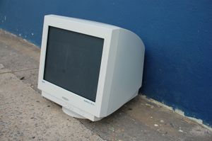 A CRT monitor abandoned on the ground